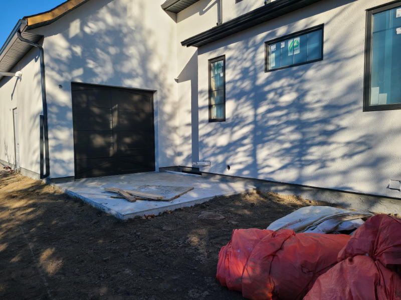 before landscaping Existing Concrete Pad South West Side